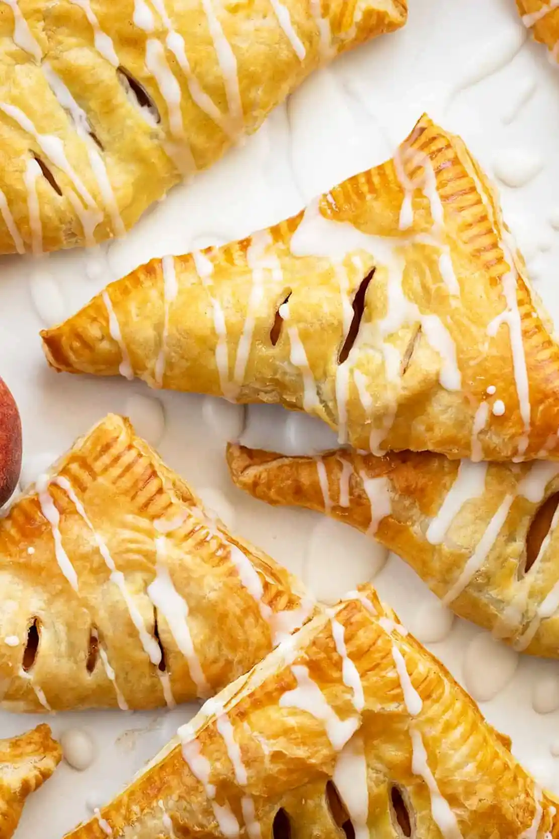 Golden Peach Puff Pastry Turnovers 3 Recipe image