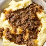 Savory Ground Beef and Gravy over Creamy Mashed Potatoes 4 Savory Ground Beef and Gravy over Creamy Mashed Potatoes