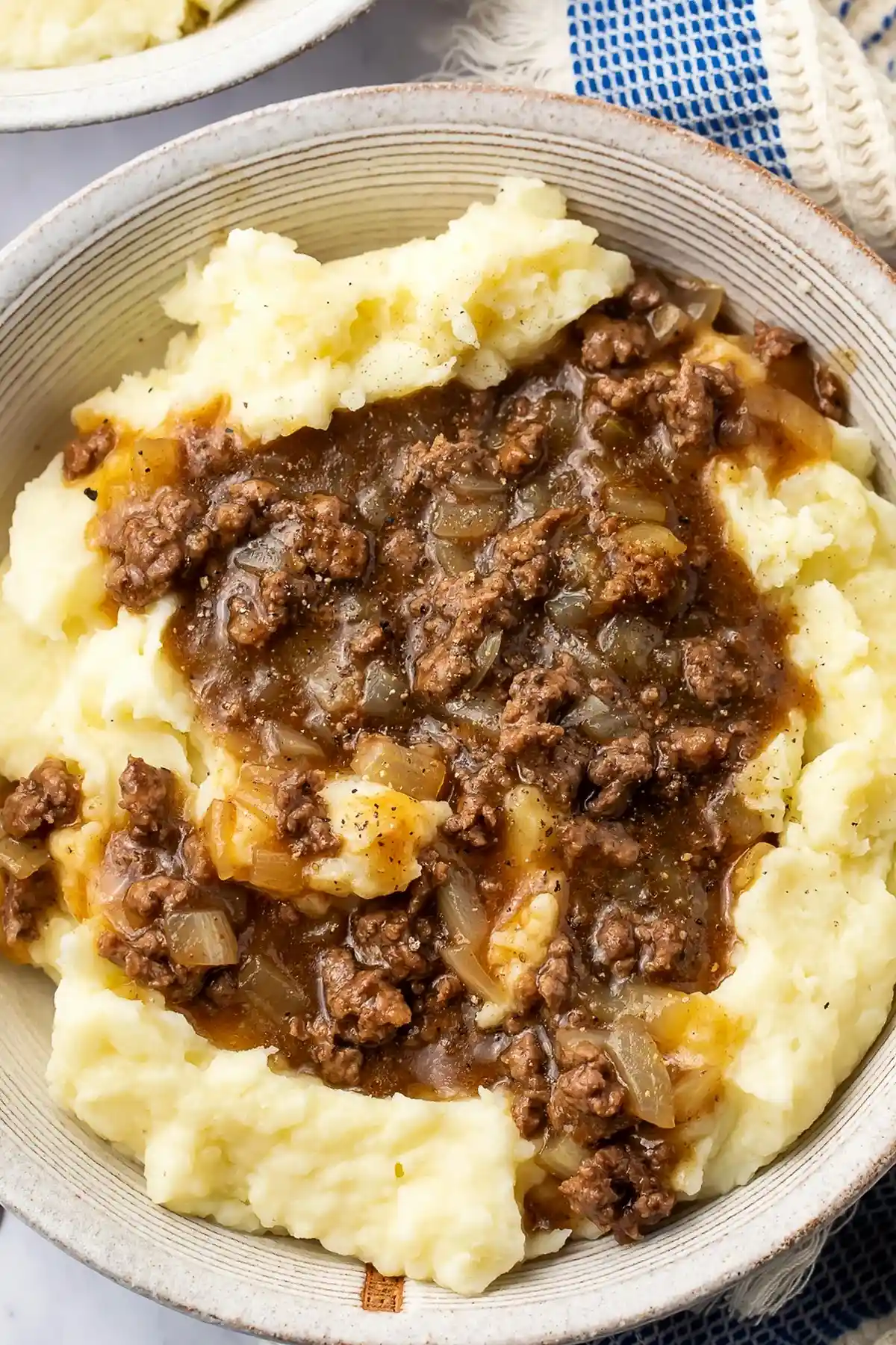 Savory Ground Beef and Gravy over Creamy Mashed Potatoes 3 Recipe image